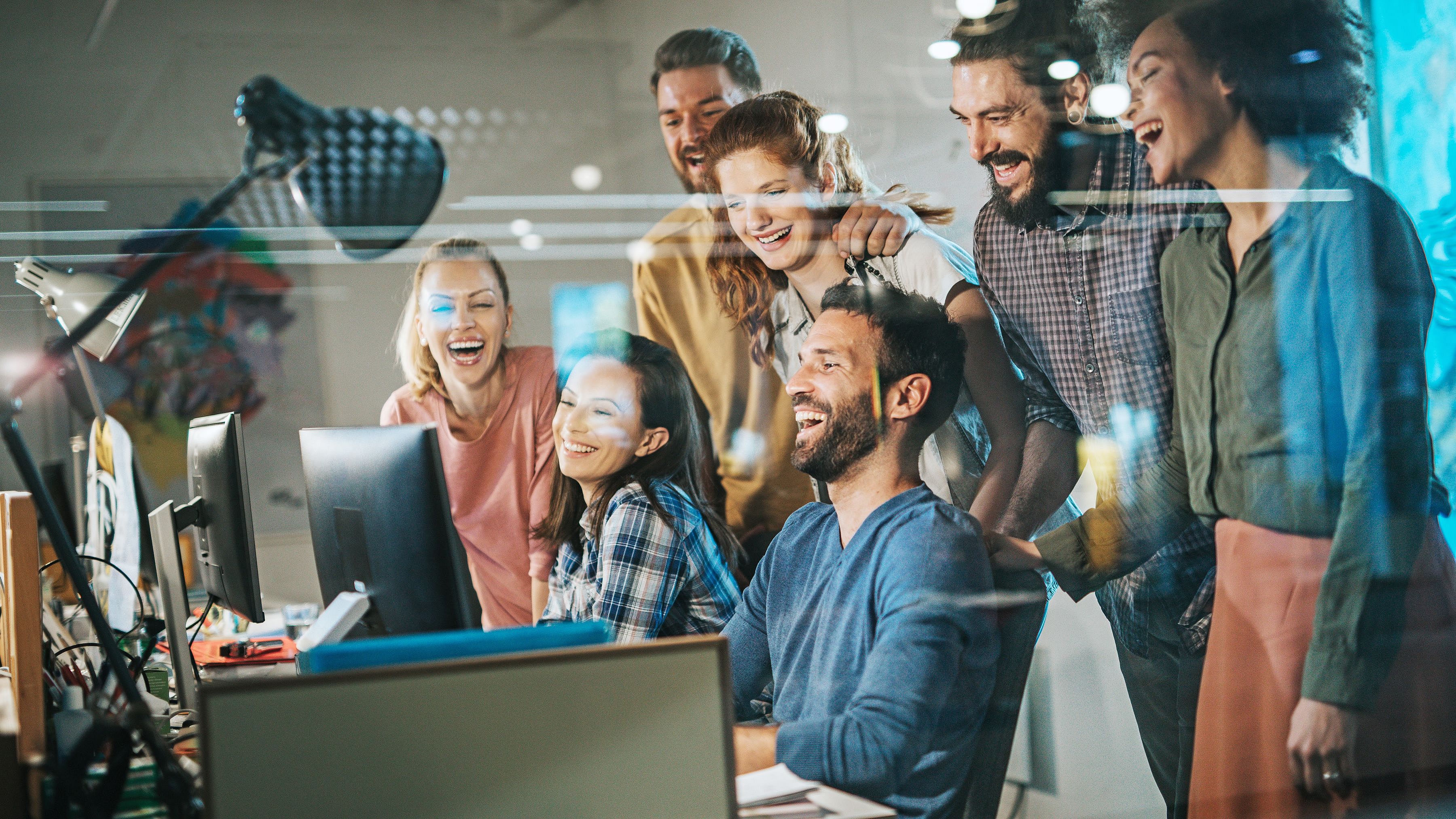 IT specialists programm on a computer